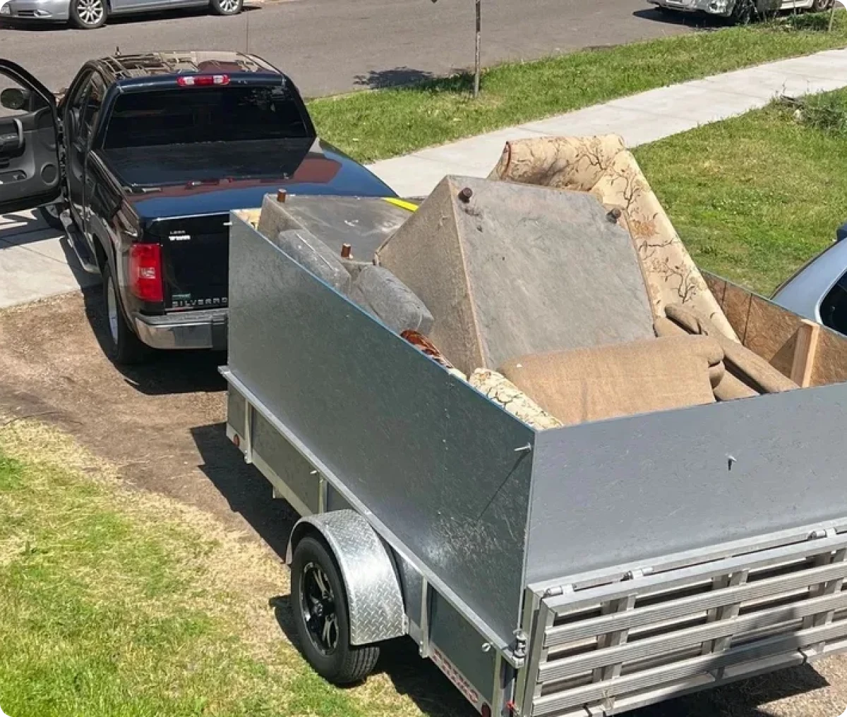 Pickup hauling discarded household items